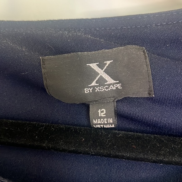 Navy Blue float size 12 dress. Super stretchy and flowy - Picture 3 of 4